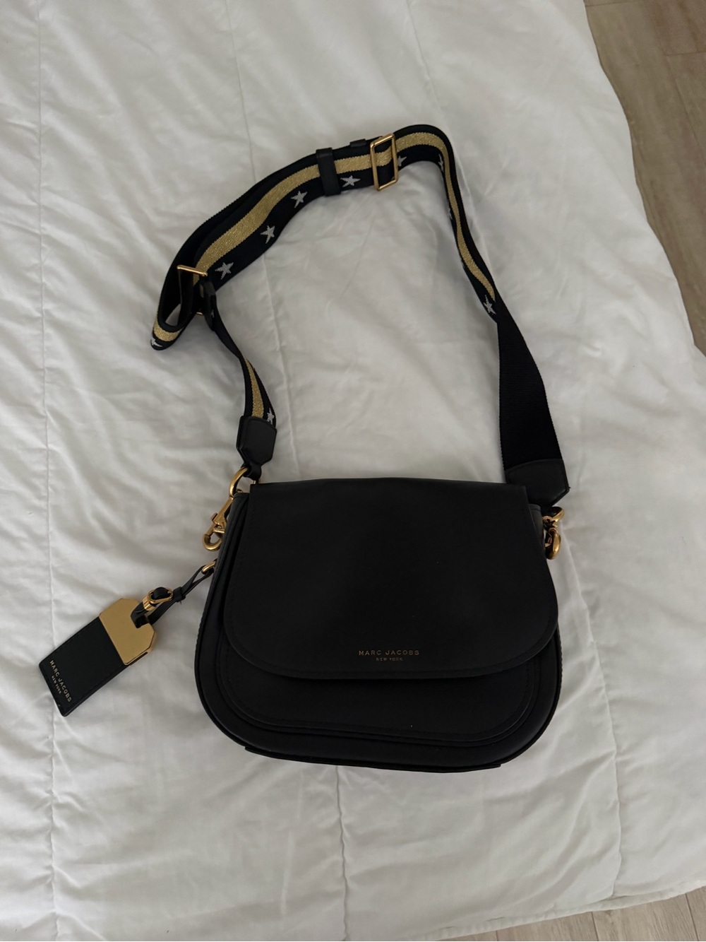 Marc Jacobs Black Saddle Crossbody with Star-Patterned Strap